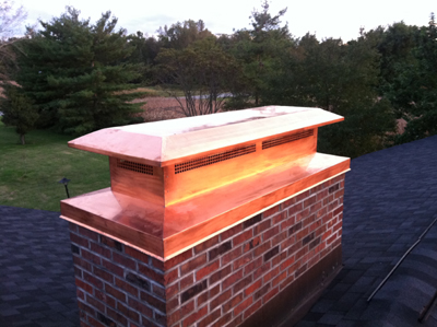 Before and after chimney cap replacement in Bayville, NY
