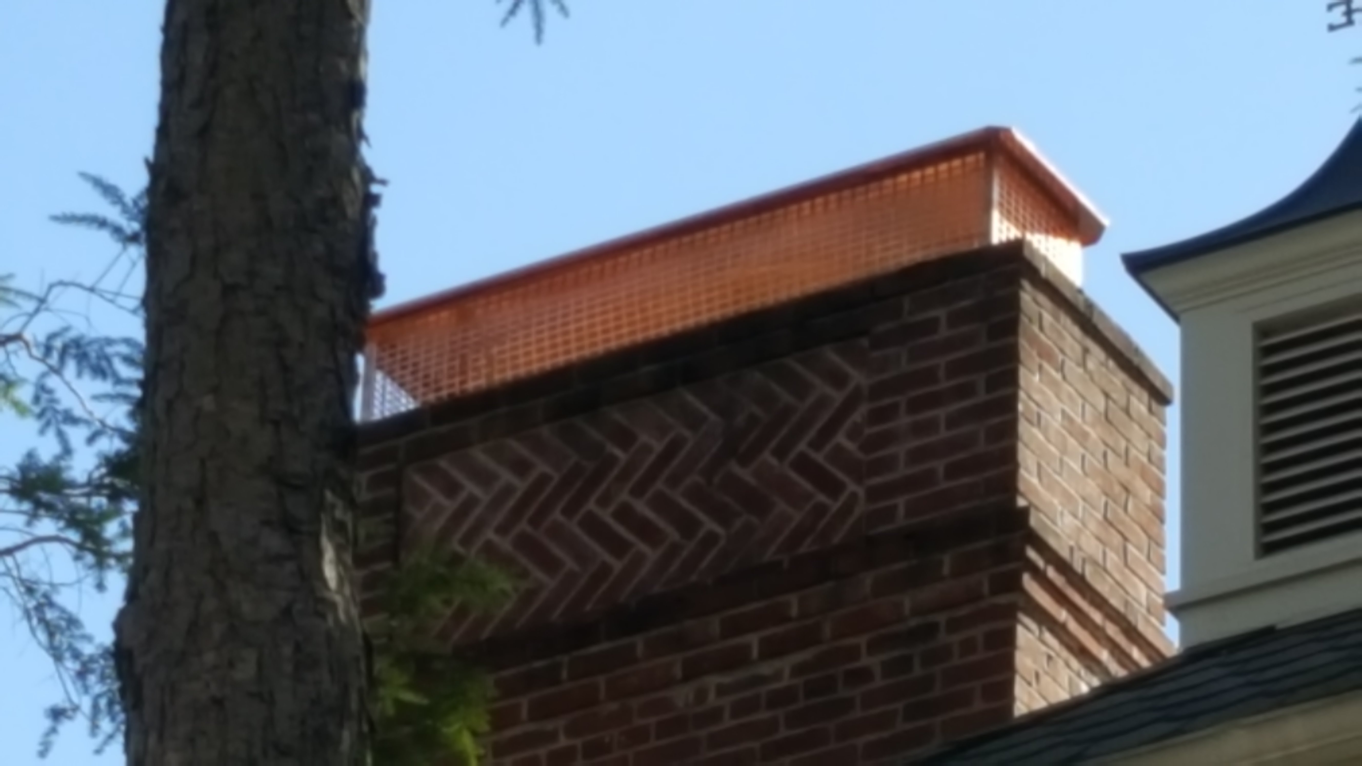 New stainless steel chimney cap installed in Bayville, NY