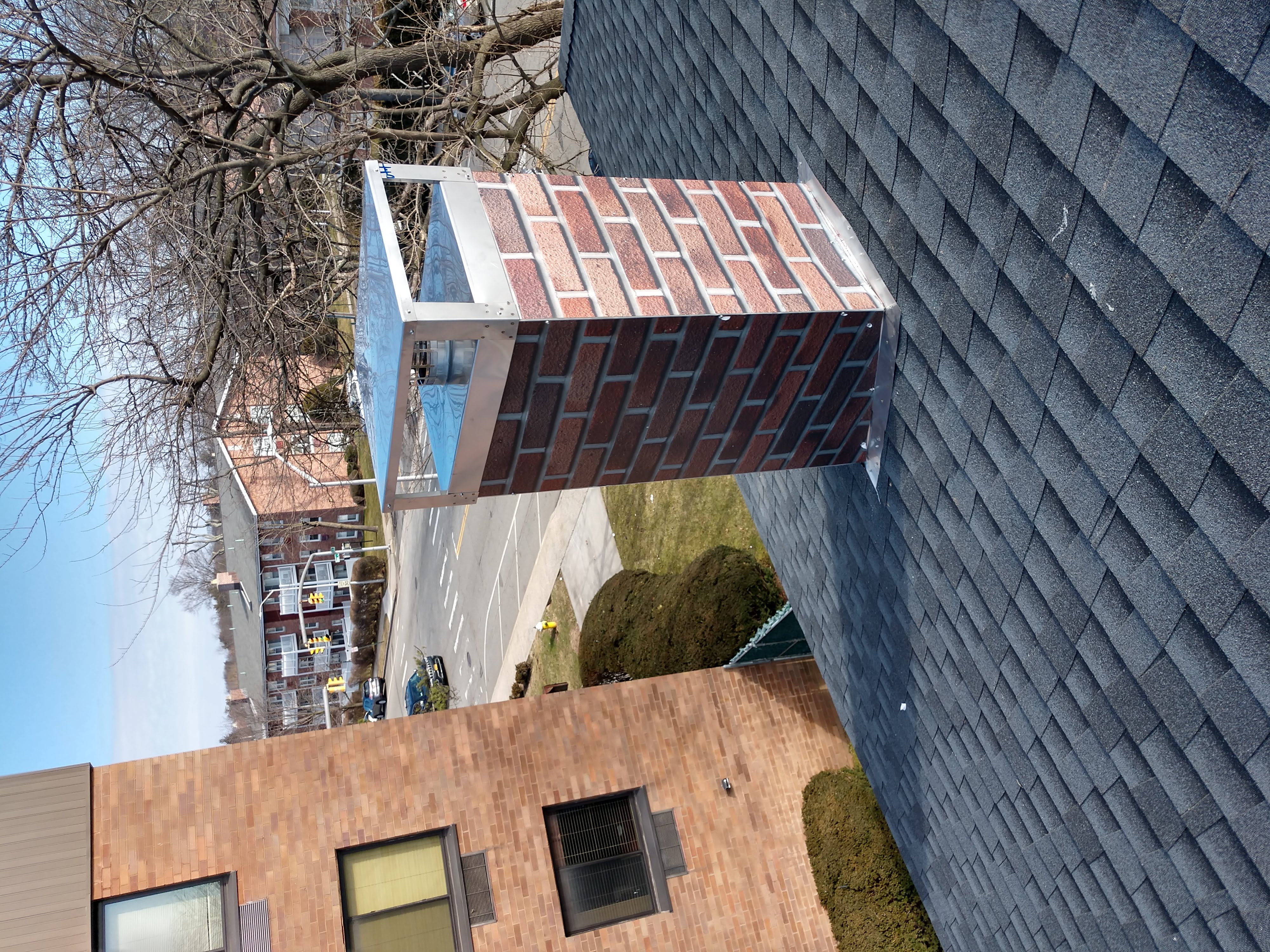 New elastomeric sealant applied to chimney crown in Bayville, NY