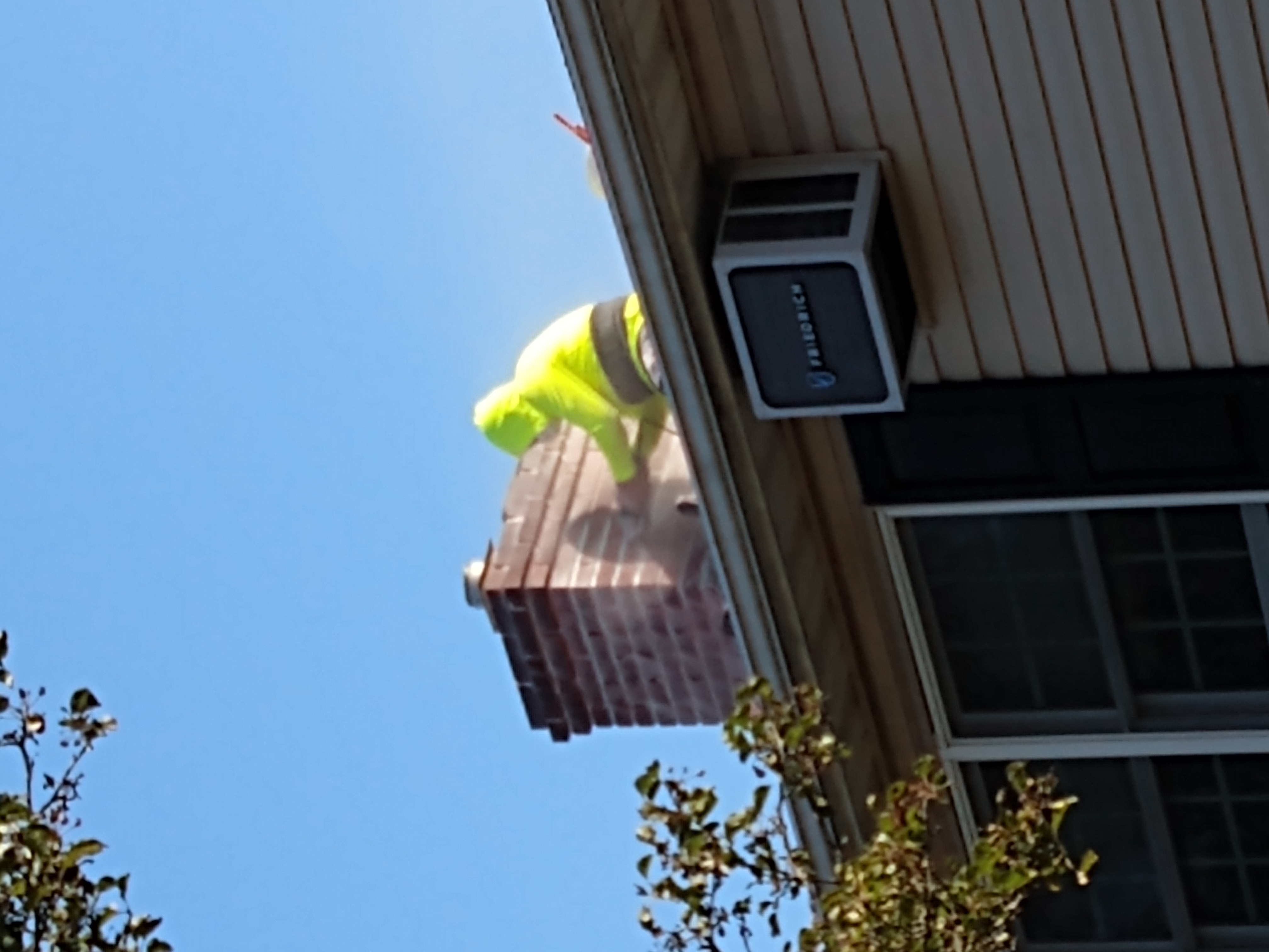 Chimney tuckpointing and mortar repair in Bayville, New York